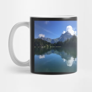 Mountain reflected in a Swiss lake Mug